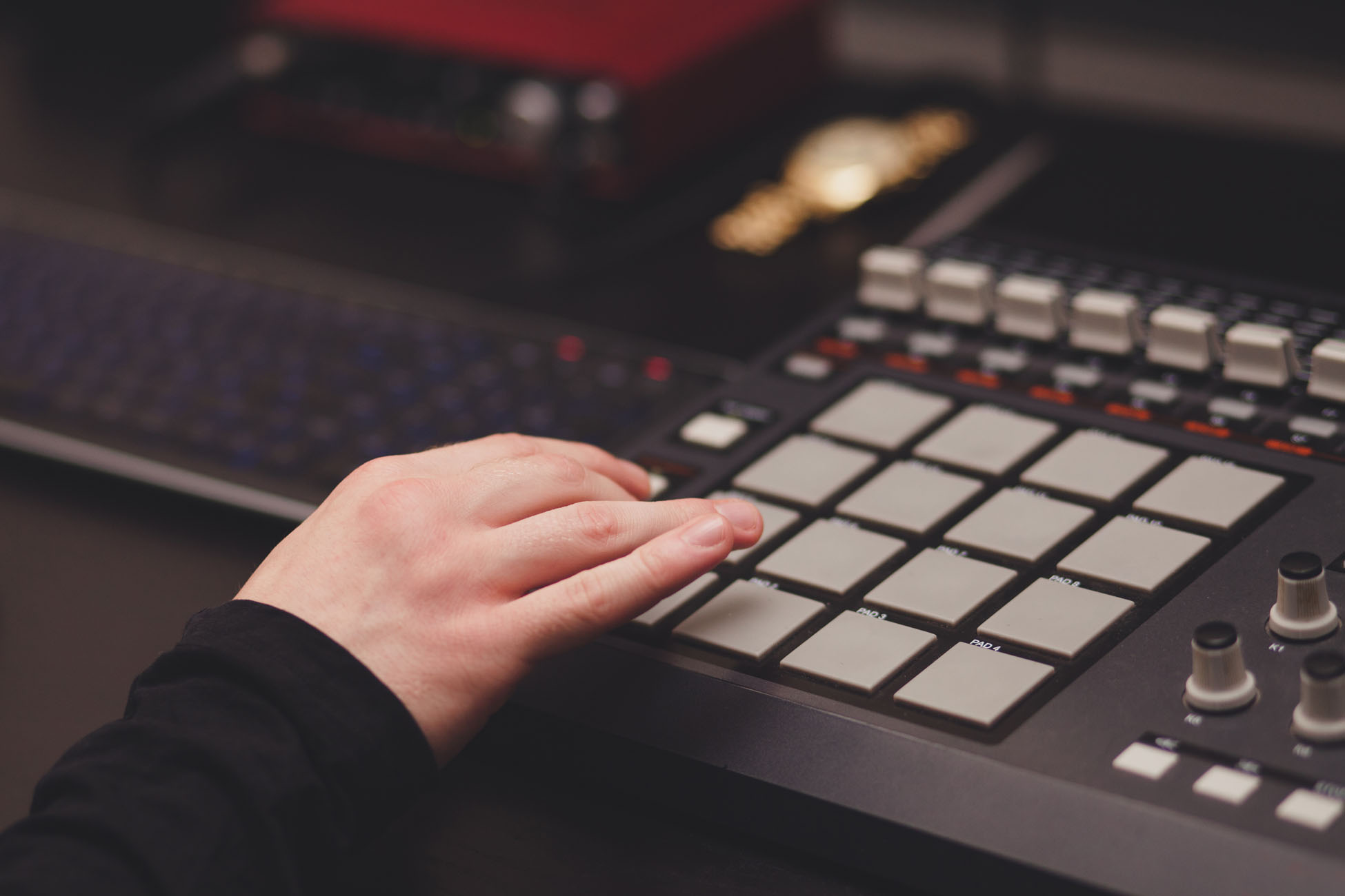 man in the studio creates electronic music